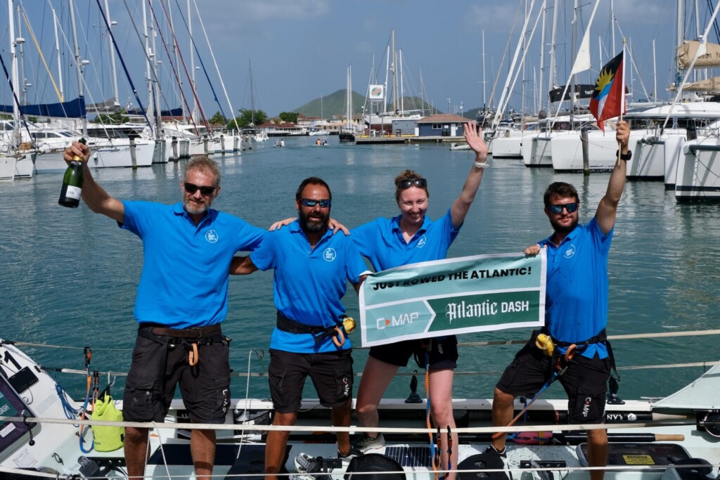 Image shows the Brightsides Atlantic rowers finishing the challenge