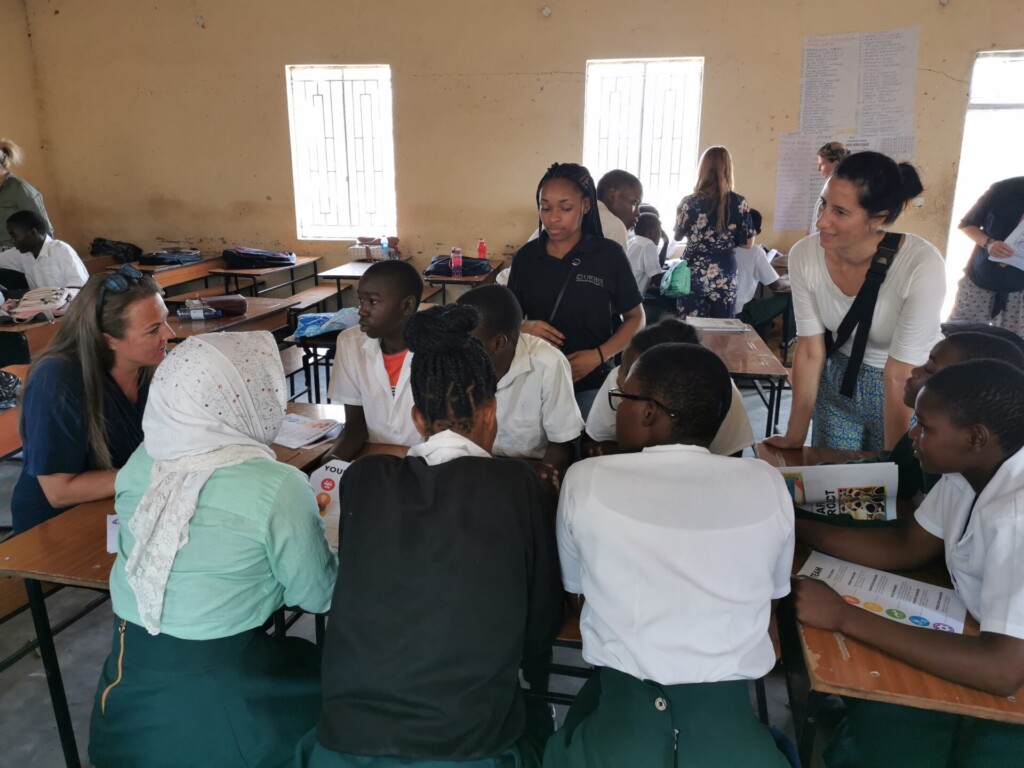 Image depicts: A Women's Partnership Challenge session in a classroom in Malawi