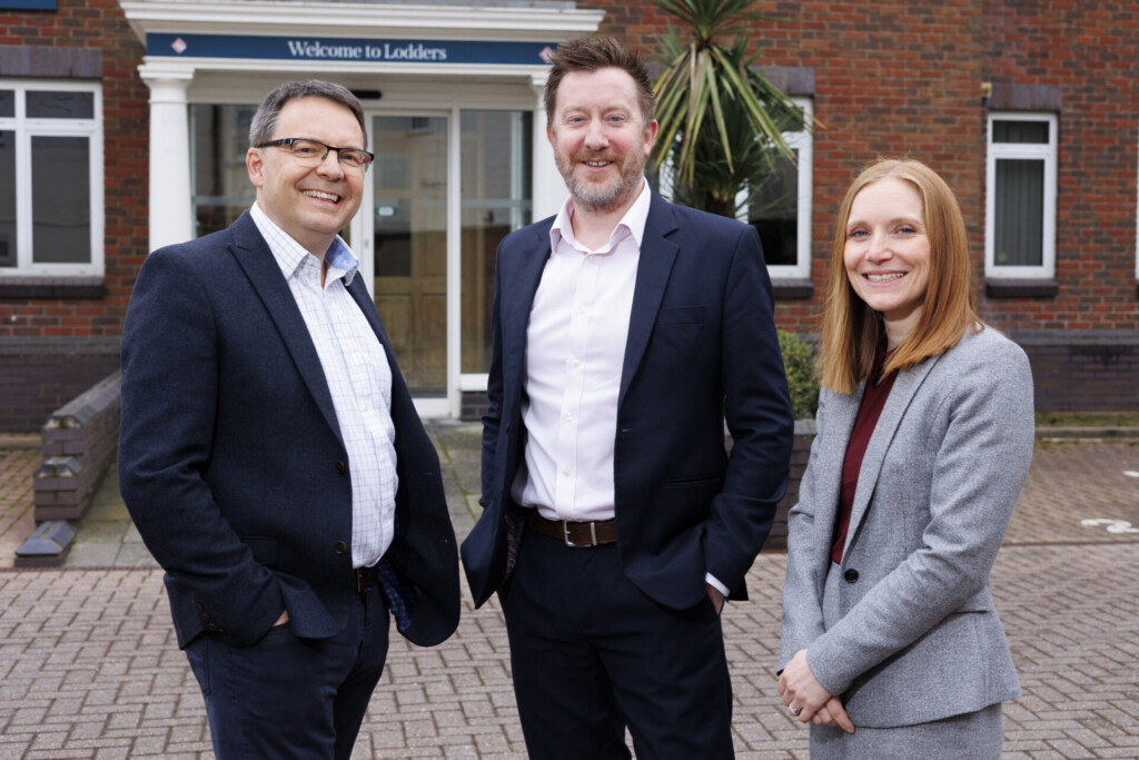 Image depicts Lodders' Mark Miller, James Hamilton, and Louise Igoe standing together