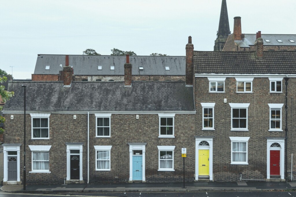 Image depicts: a row of properties