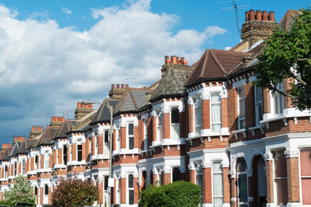 Renters Rights Bill: image shows a line of terrace houses on a road in the UK.