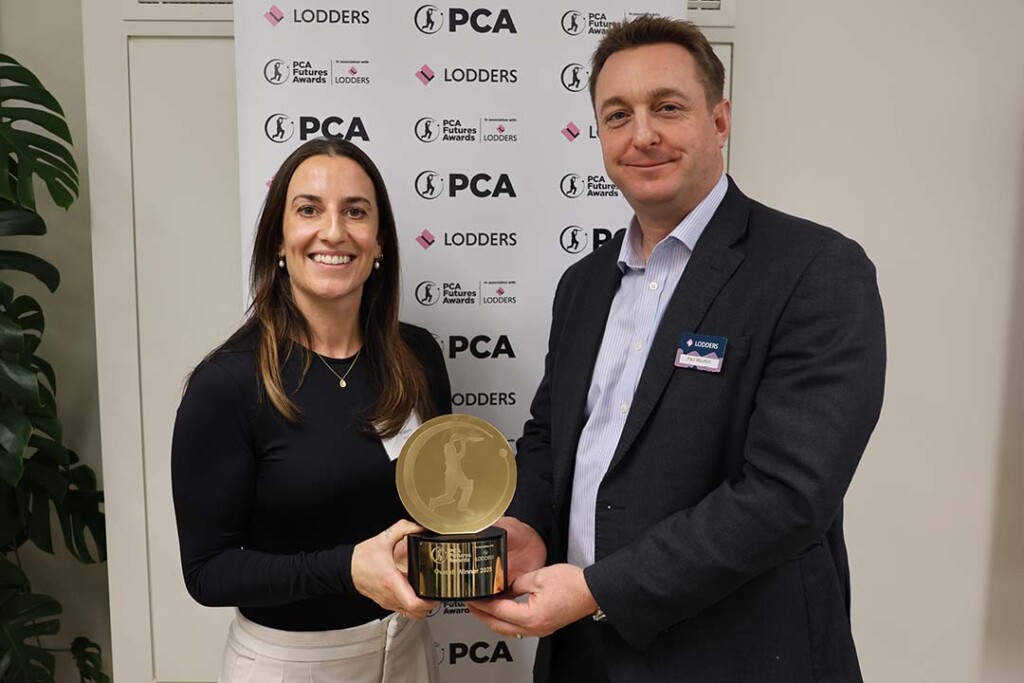 Fi Morris and Paul Mourton holding PCA trophy
