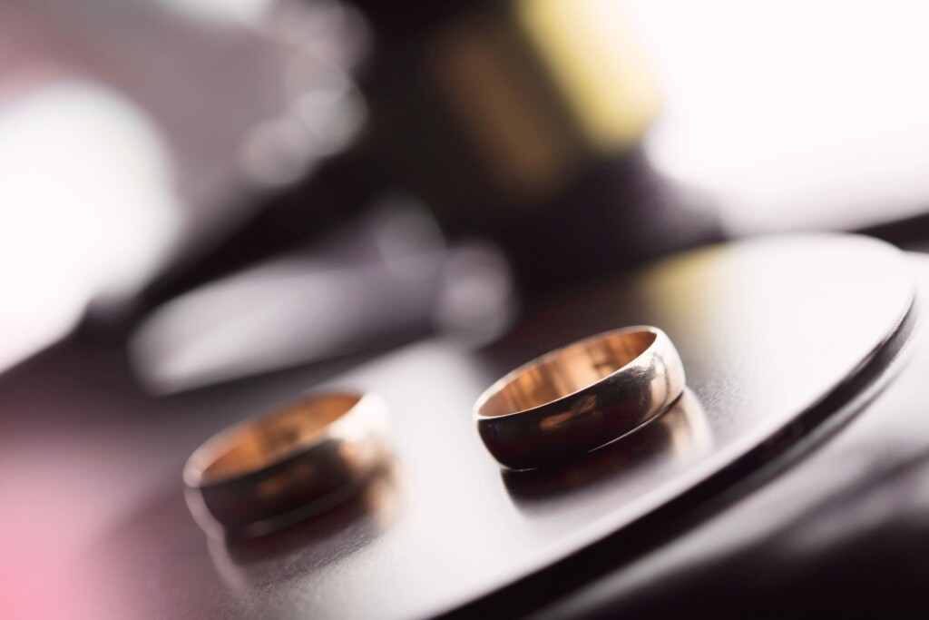 Common myths about divorce: image of two wedding rings on a table